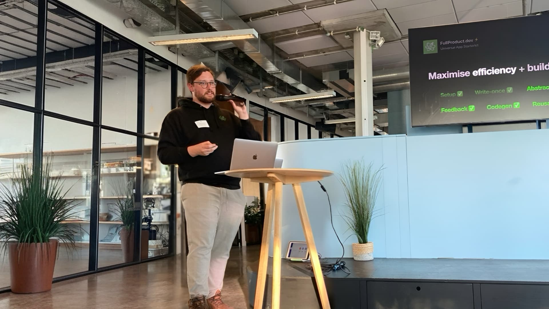 Picture of me giving a talk on maximising efficiency by building universal apps